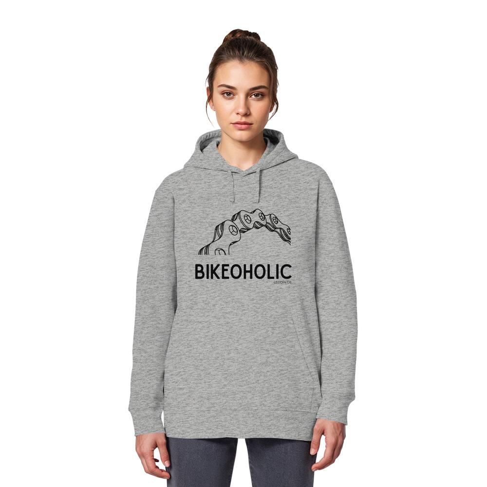 Weibliches Model trägt grauen Fahrrad Hoodie unisex mit Bikeoholic Print
