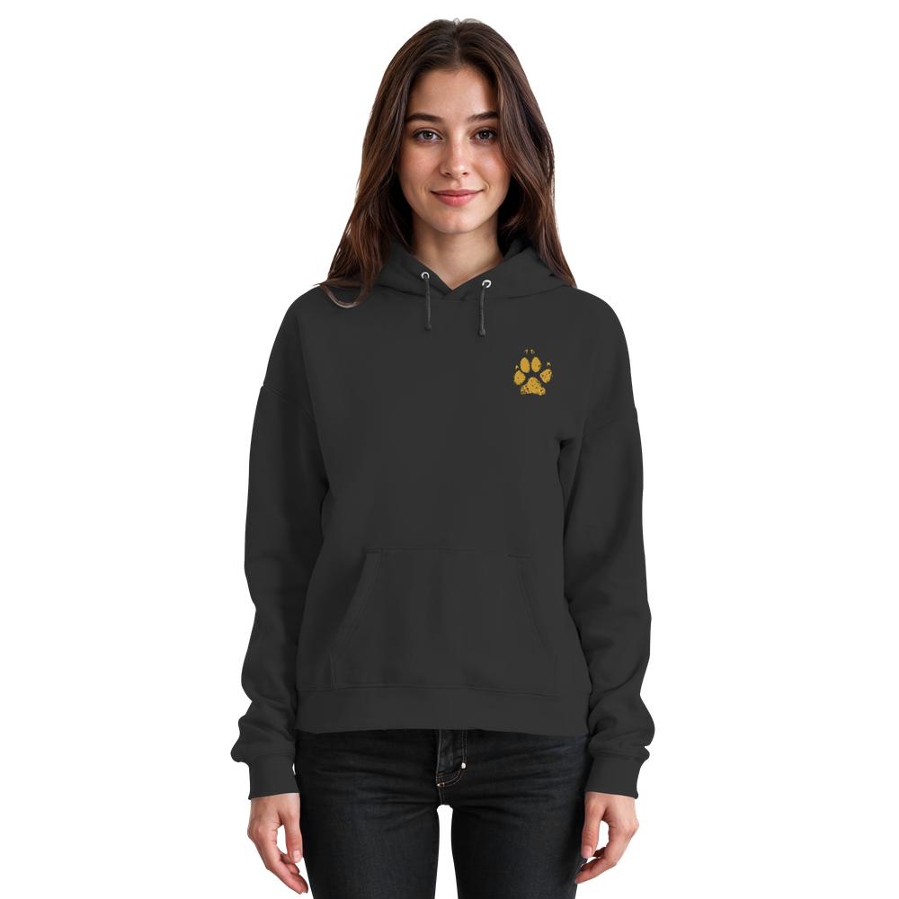 Schwarzer Unisex Hunde Hoodie an Frau mit Pfotenprint vorne
