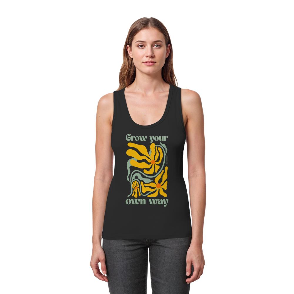 Frau trägt schwarzes Grow your own way Tank Top